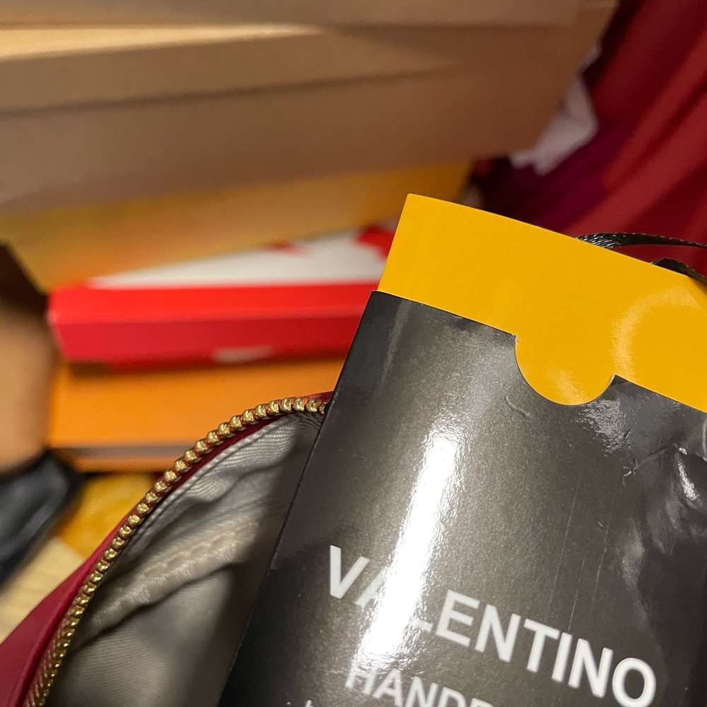 Authentic Valentino crossbody bag, Red and had been worn slightly